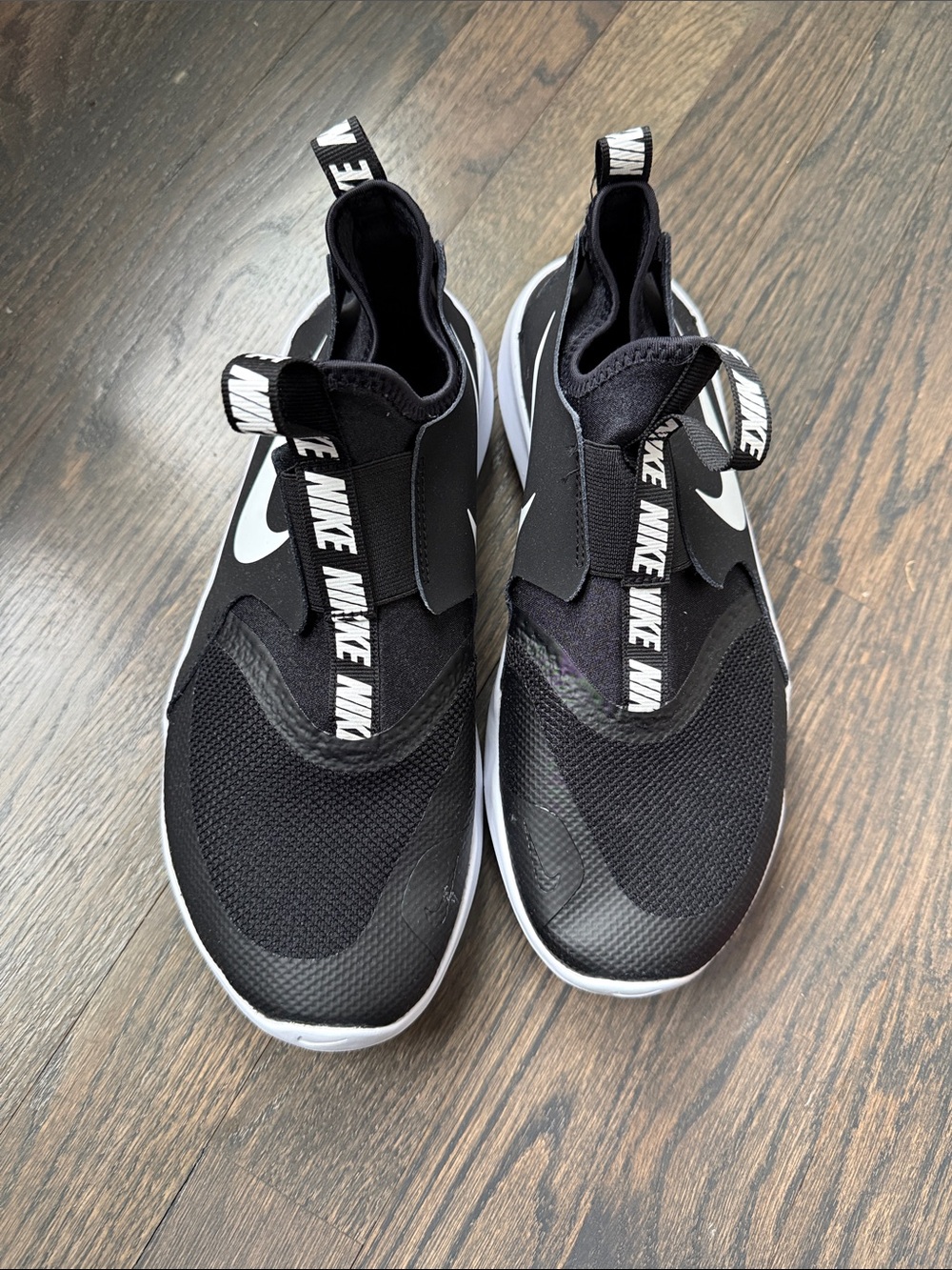 Nike Black and White Kids Slip-On Sneakers with Branded Strap